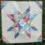 Charming Sawtooth Star Baby Quilt