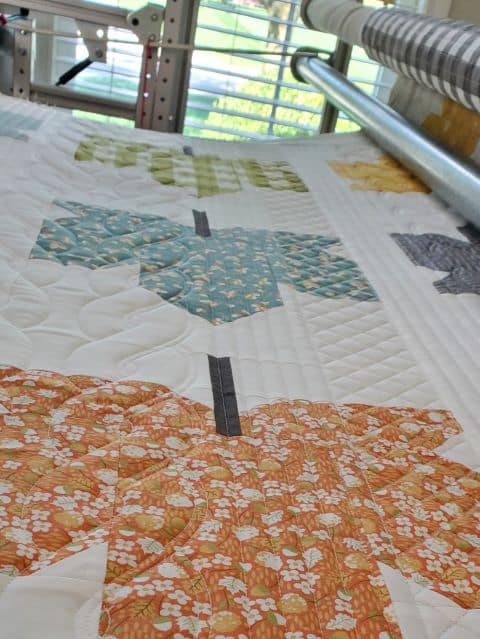 Fall Leaves quilt blocks on a longarm Cable Knit E2E